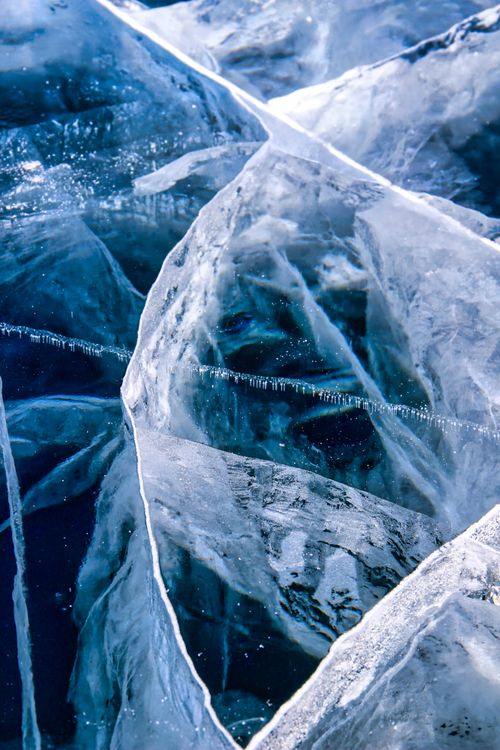 Free Stunning close-up of intricate blue ice formations showcasing winter's beauty. Stock Photo
