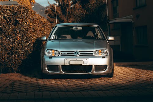 View of a Silver Volkswagen Golf R32 Parked in Sunlight 