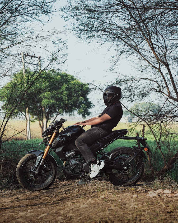 Biker In Rural Scenery