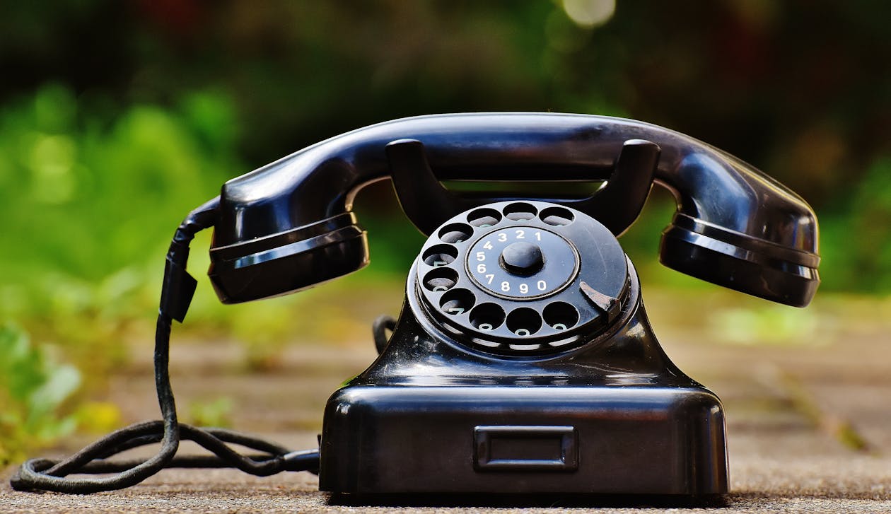 Free Selective Focus Photography of Black Rotary Phone Stock Photo