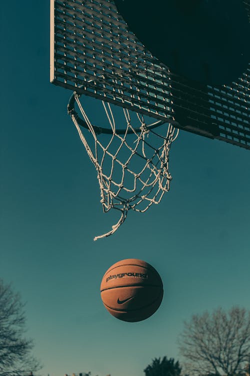 Ball Falling from Basketball Hoop 