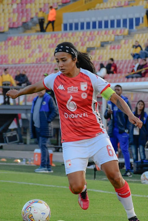 A Female Player during a Soccer Match