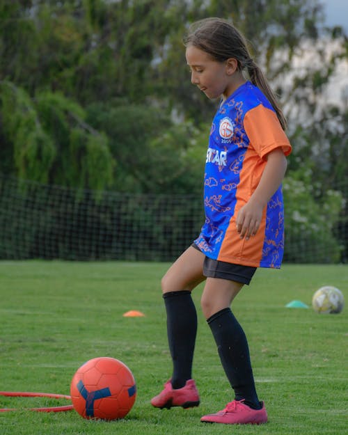 A Girl at a Soccer Training 