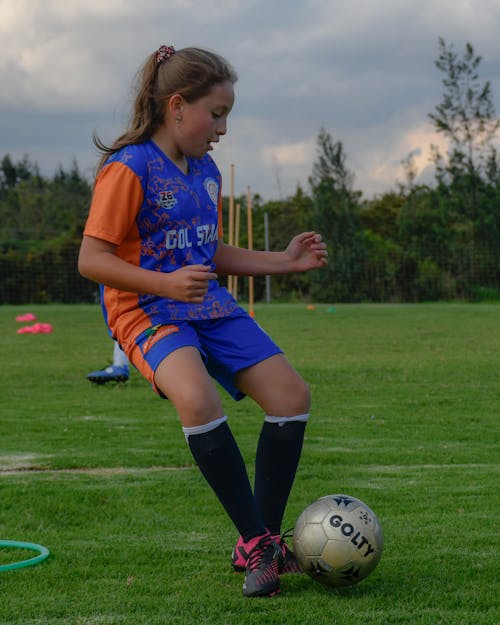 A Girl at a Soccer Training 