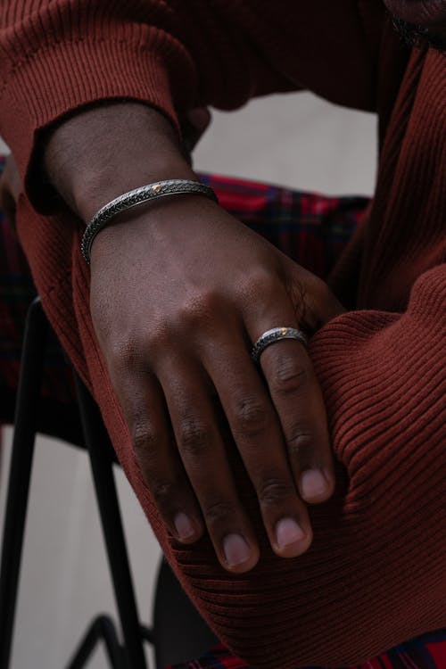 Silver Ring and Bracelet on Man Hand