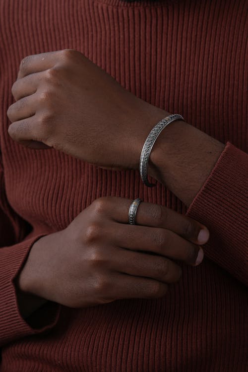 Silver Bracelet and Ring on Hands