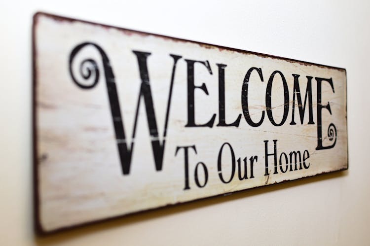 Welcome To Our Home Print Brown Wooden Wall Decor