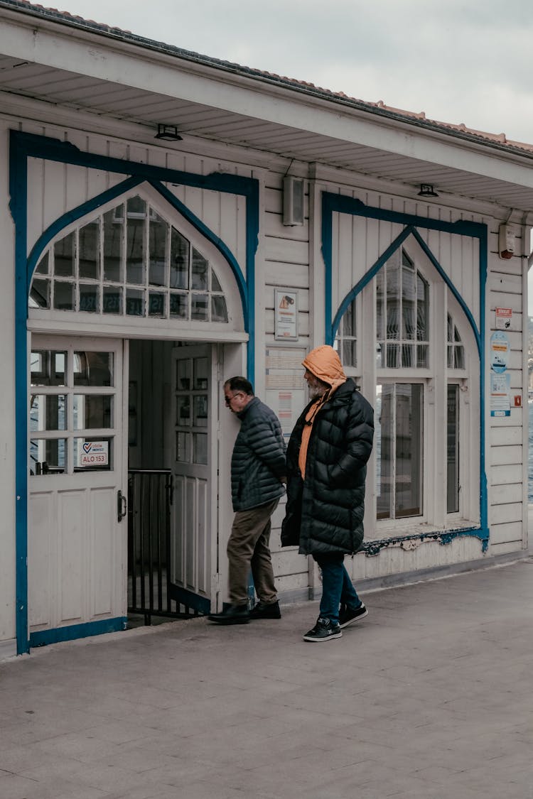 People Entering A Building 