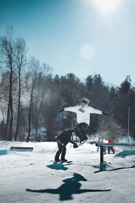 Man Riding a White Snowboard during Daytime · Free Stock Photo