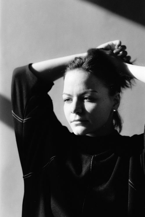 Free Elegantly composed black and white portrait of a woman in thoughtful pose. Stock Photo