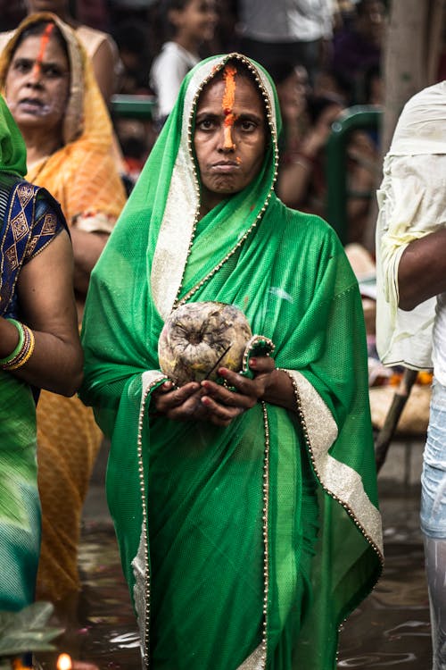 Woman Holding Coconut Fruit