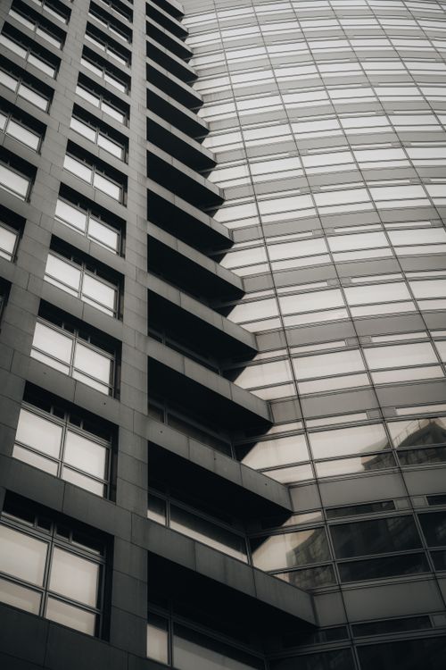 Free Monochrome view of contemporary high-rise building in Amsterdam, showcasing urban architecture. Stock Photo