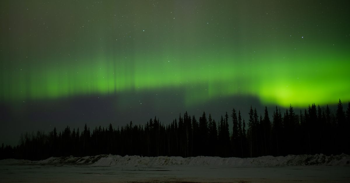 Alaska Brooks Range tundra, remote highway, winter aurora borealis, truck stop desert