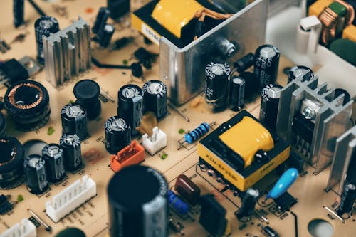 Free Black Transistor Beside Capacitor Stock Photo