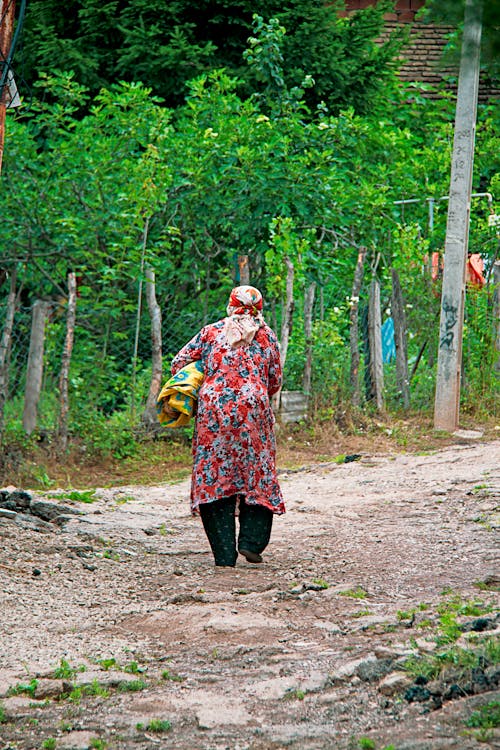 Old Woman Walking Village Road