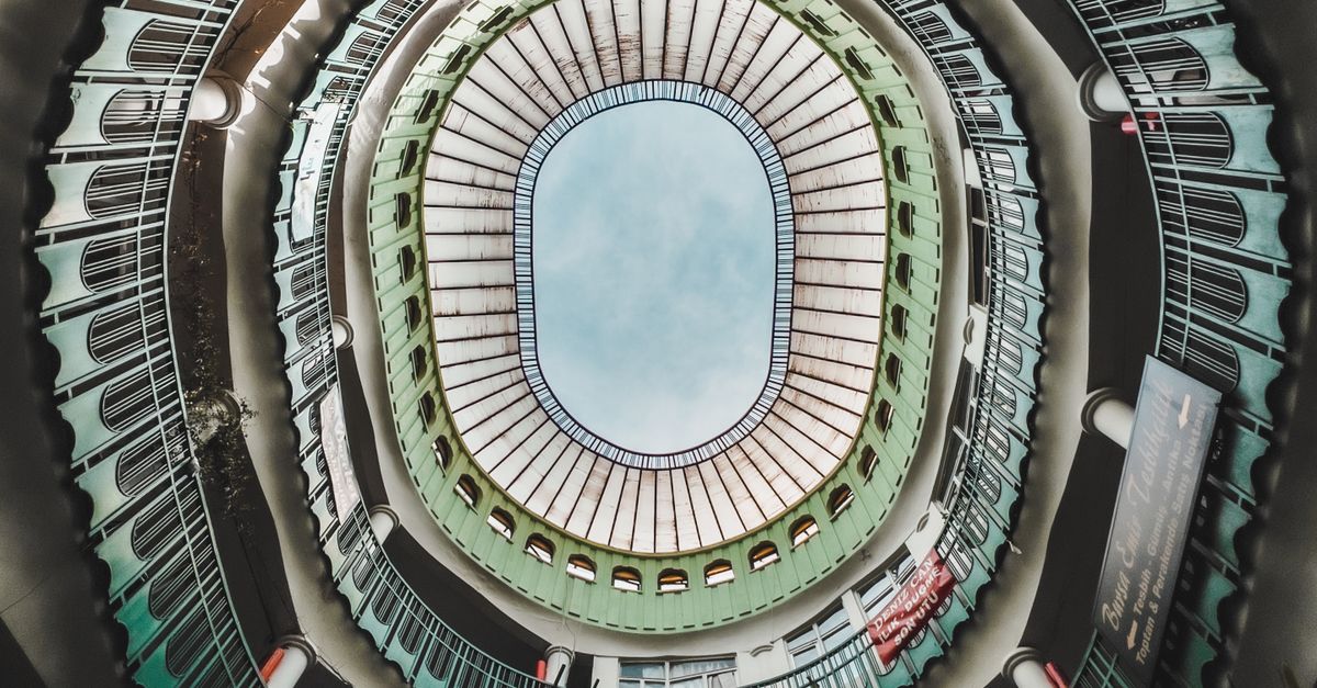 Round Building Texture A Round Building Photographed from a Courtyard · Free Stock Photo