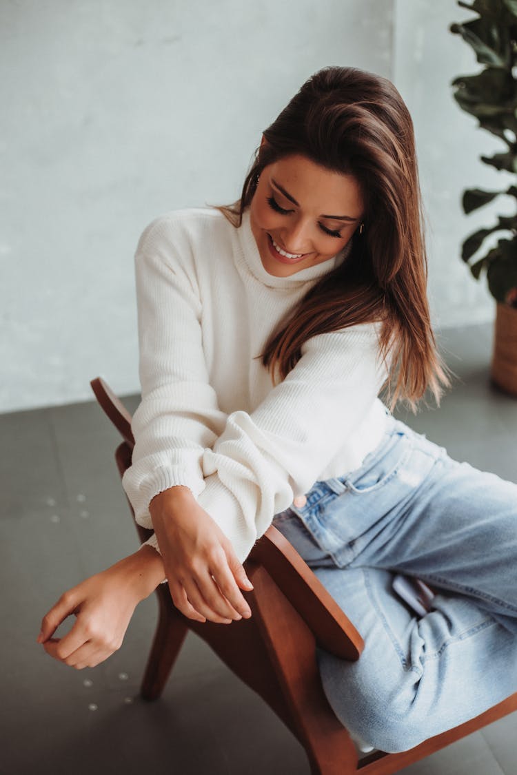 Smiling Woman On Chair