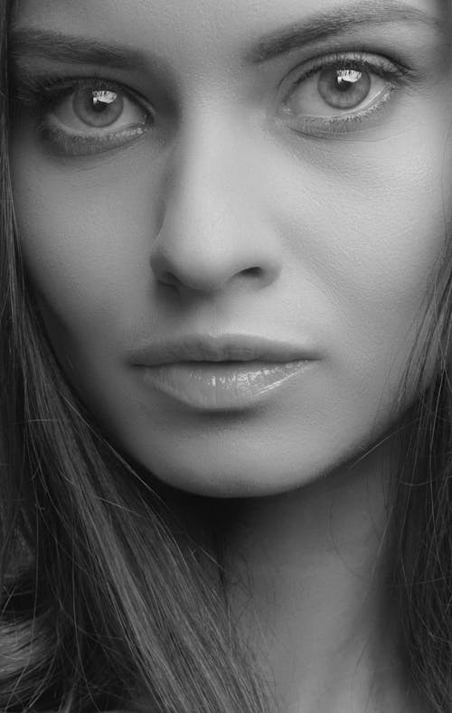 Black and White Close-up Portrait of a Young Woman 