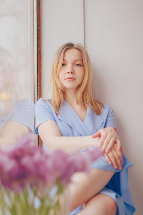 Girl Sitting in the Window 