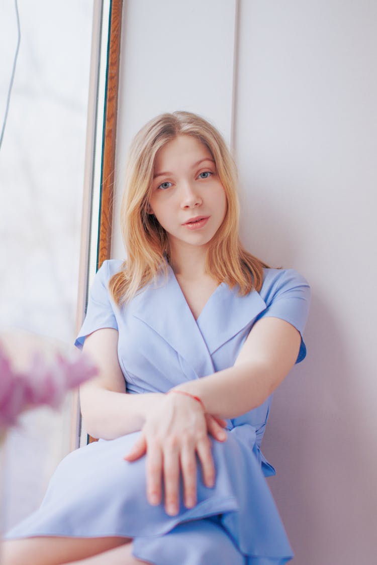 Portrait Of A Girl Wearing A Blue Dress 