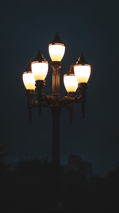 Close-up of a Vintage Street Lantern Illuminated in the Dark 