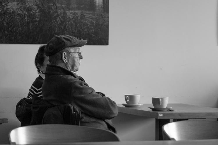 Elderly Couple At Cafe