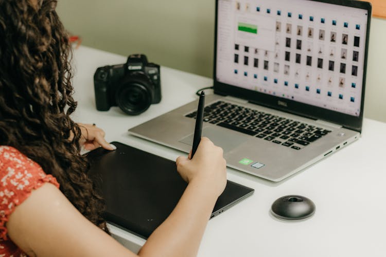 Photographer Working On Laptop