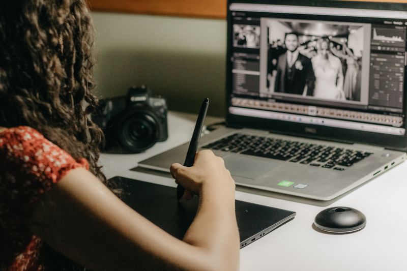 Frustrated photographer editing photos