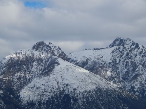 Free Captivating view of rugged, snow-covered mountains in Bariloche, Argentina during winter. Stock Photo