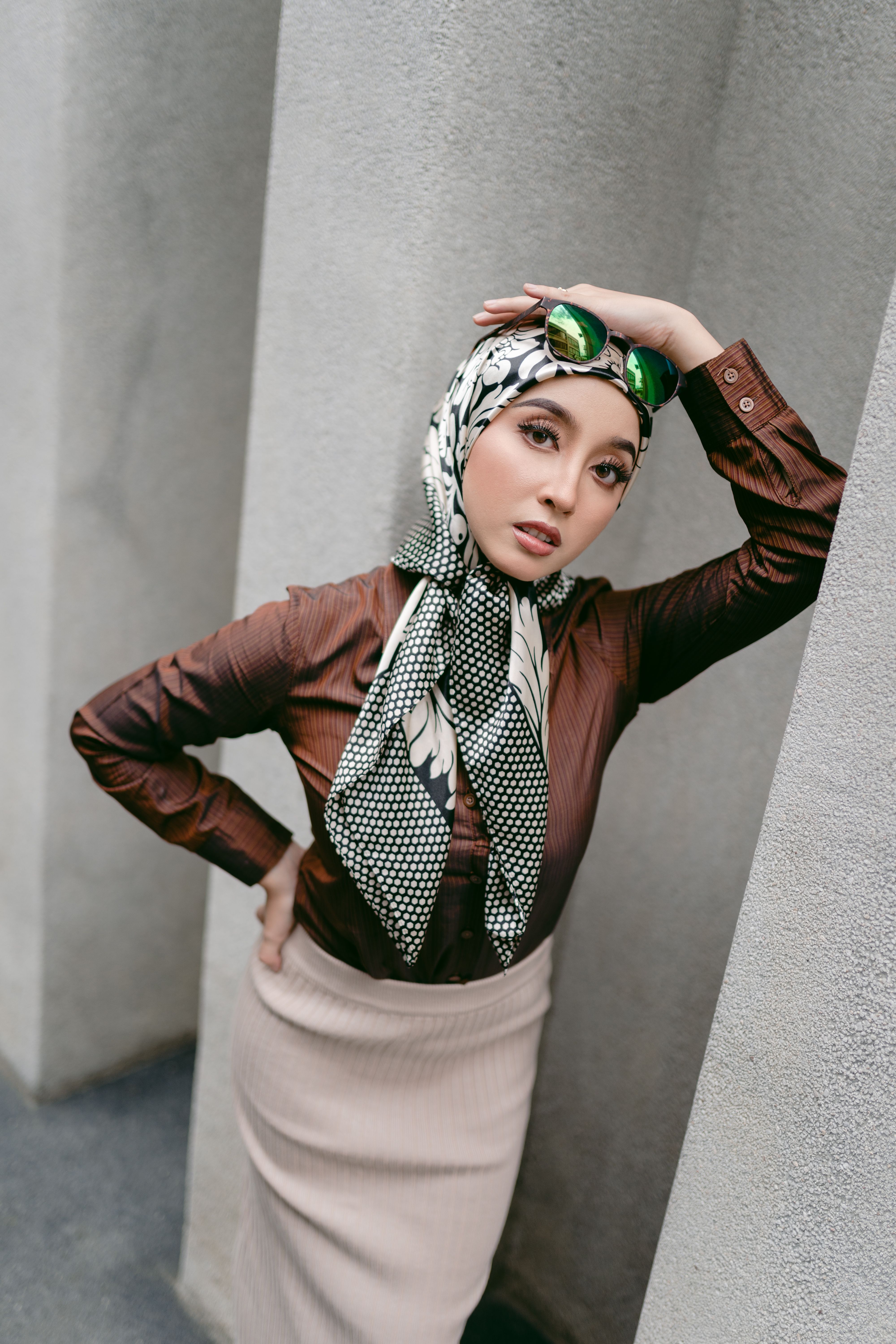 Portrait of a Pretty Woman Wearing a Headscarf · Free Stock Photo