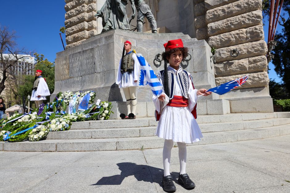 Young boy in traditional Greek clothing at Independence Day celebration in Athens