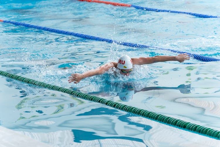 Person Swimming In Pool