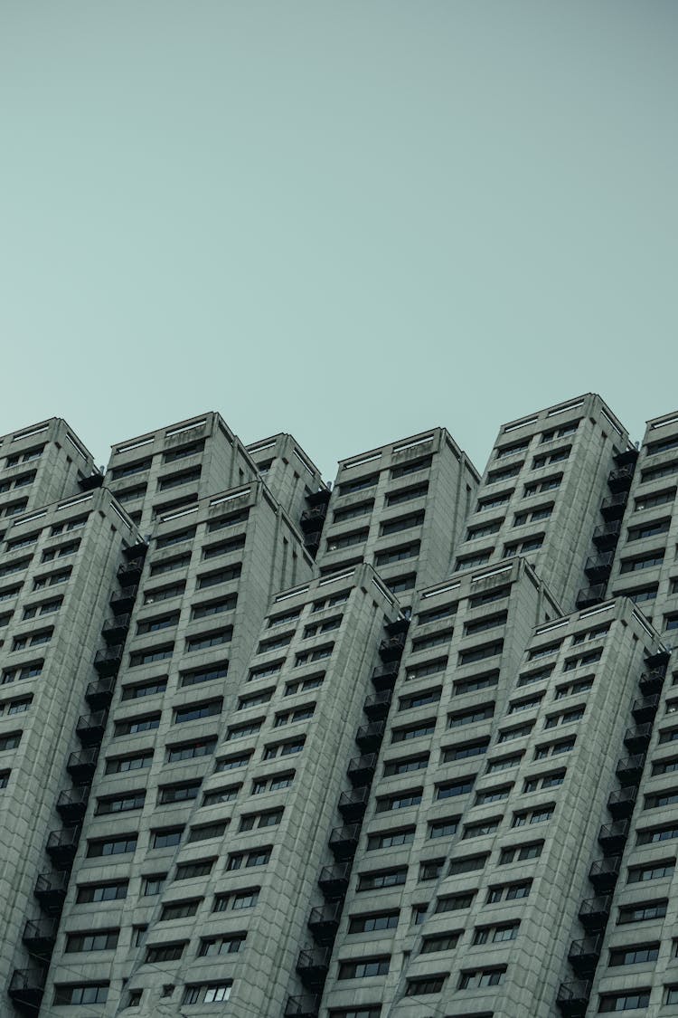 Residential Buildings On Sky Background