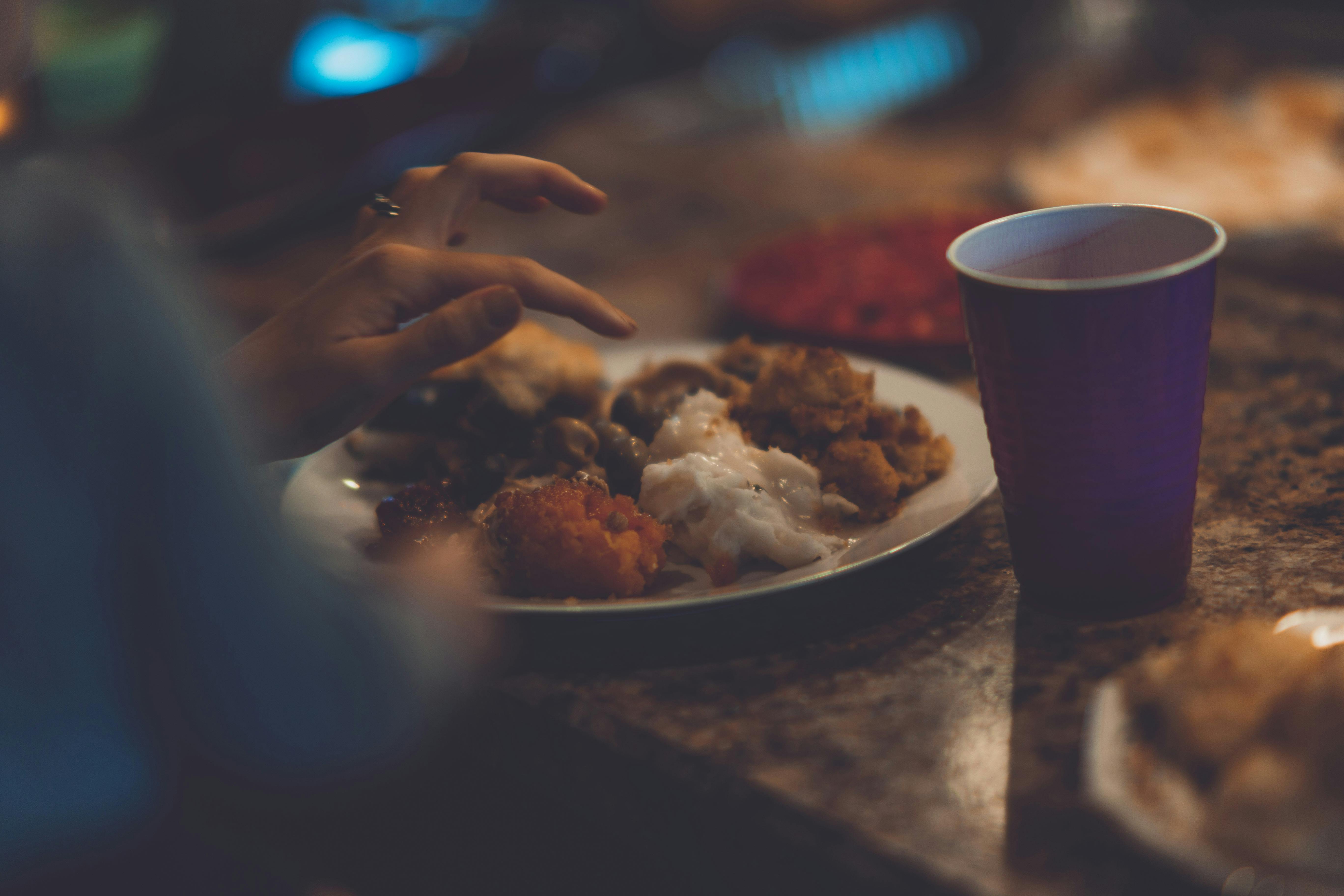 Plate of Cooked Food Beside Cup \u00b7 Free Stock Photo