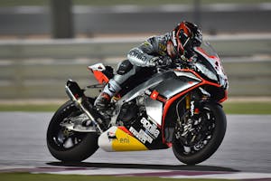 Rider's Riding on Gray and Black Sports Bike