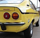 Yellow and Black Muscle Car Parked during Daytime