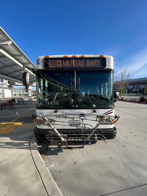 Free Front view of public bus Route 60 at Milpitas BART, California, on a clear day. Stock Photo