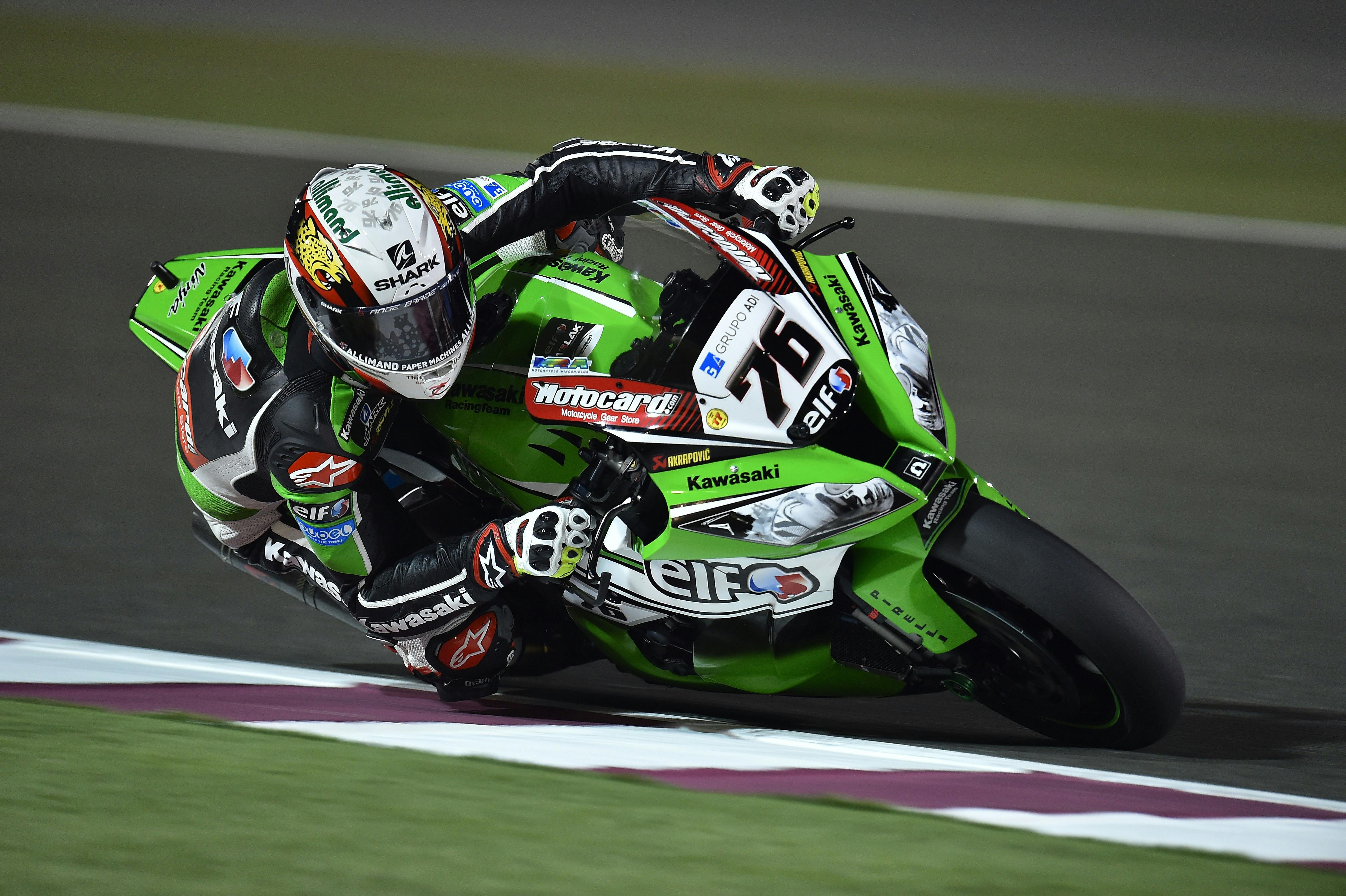 Green and Black 76 Kawasaki Motogp Rider · Free Stock Photo