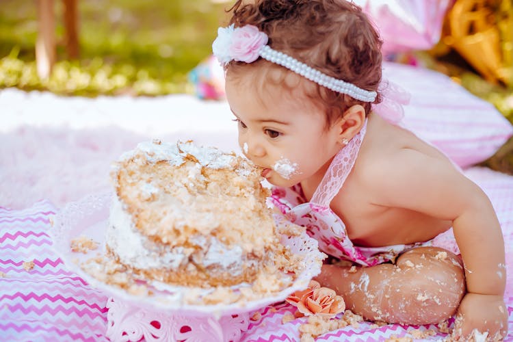 Child Eating Birthday Cake