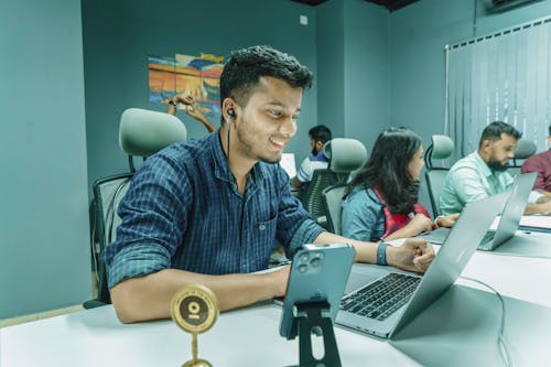 Smiling Man Working in Office