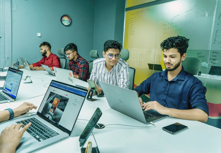 Men Working On Laptop In Coworking Space