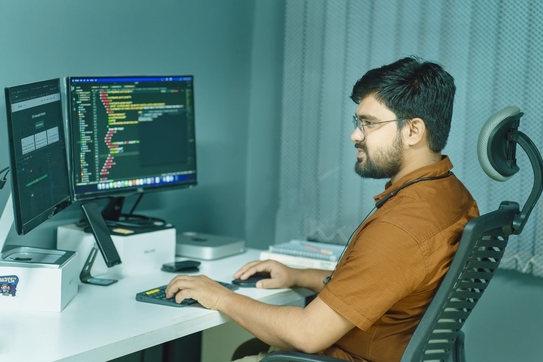Developer and designer reviewing UI design tokens and component specifications