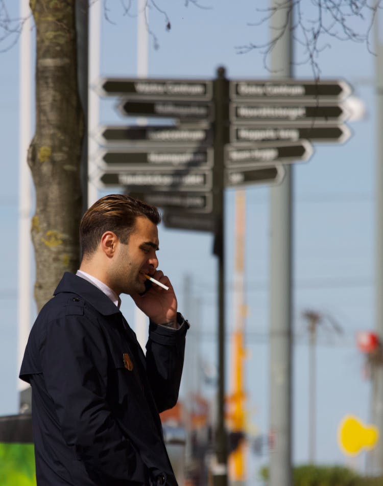 Man Talking On Phone