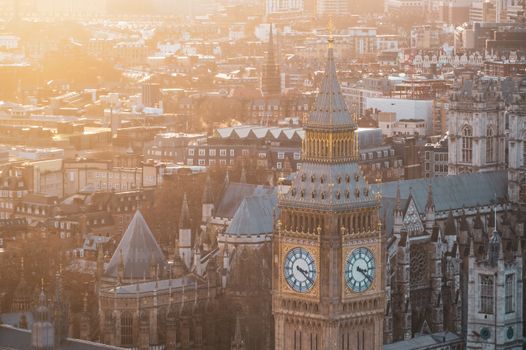A beautiful view of Big Ben at sunset, showcasing the iconic London cityscape in warm tones.