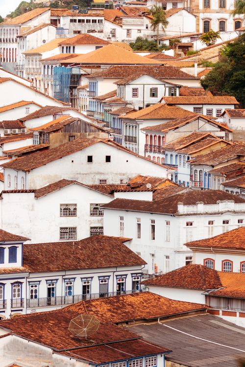 Free High angle view of traditional colonial townhouses with clay roofs in Ouro Preto, Brazil. Stock Photo