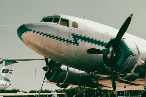 Free Close-up of a vintage propeller aircraft displayed outdoors in Budapest. Stock Photo