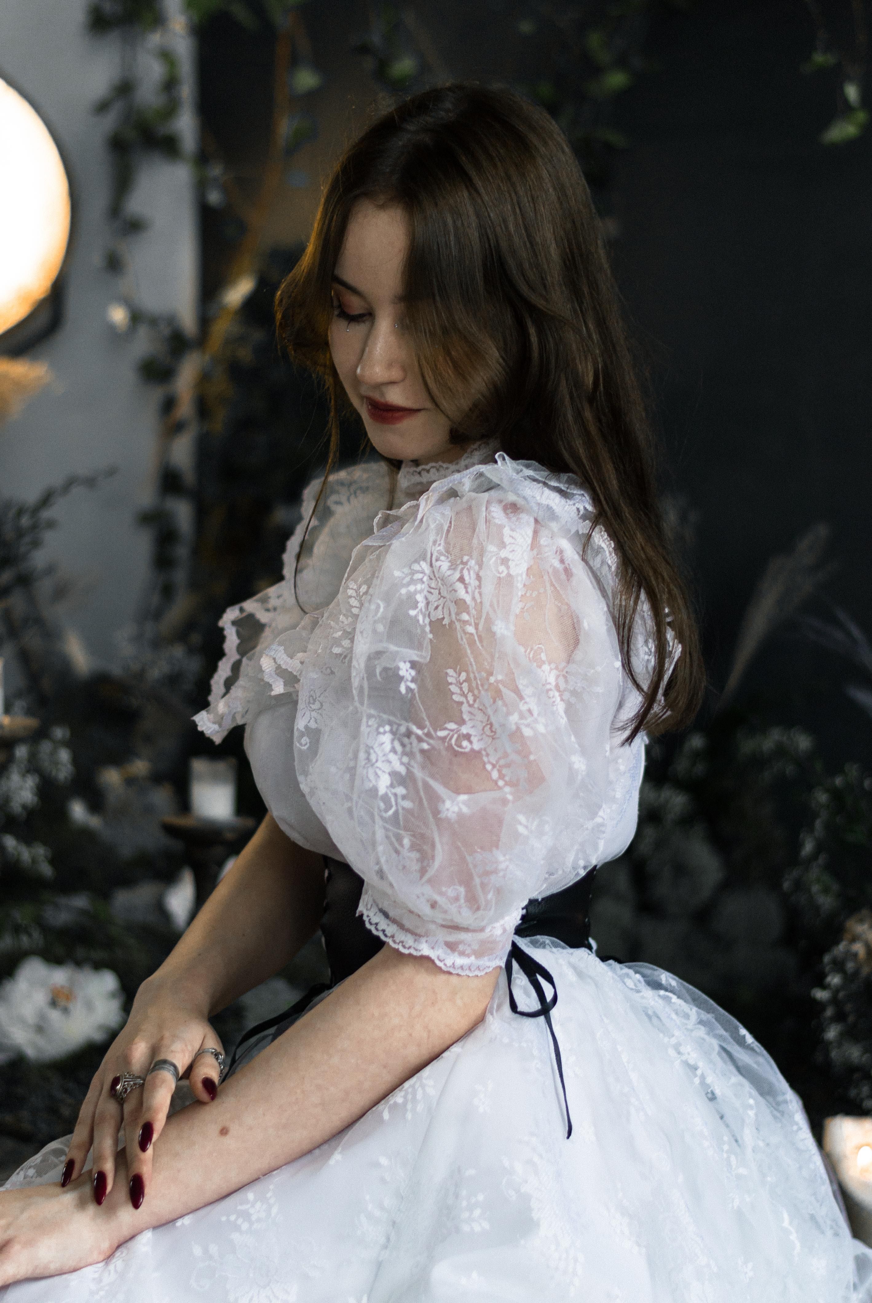 Portrait of a Young Woman in a Lace Dress · Free Stock Photo
