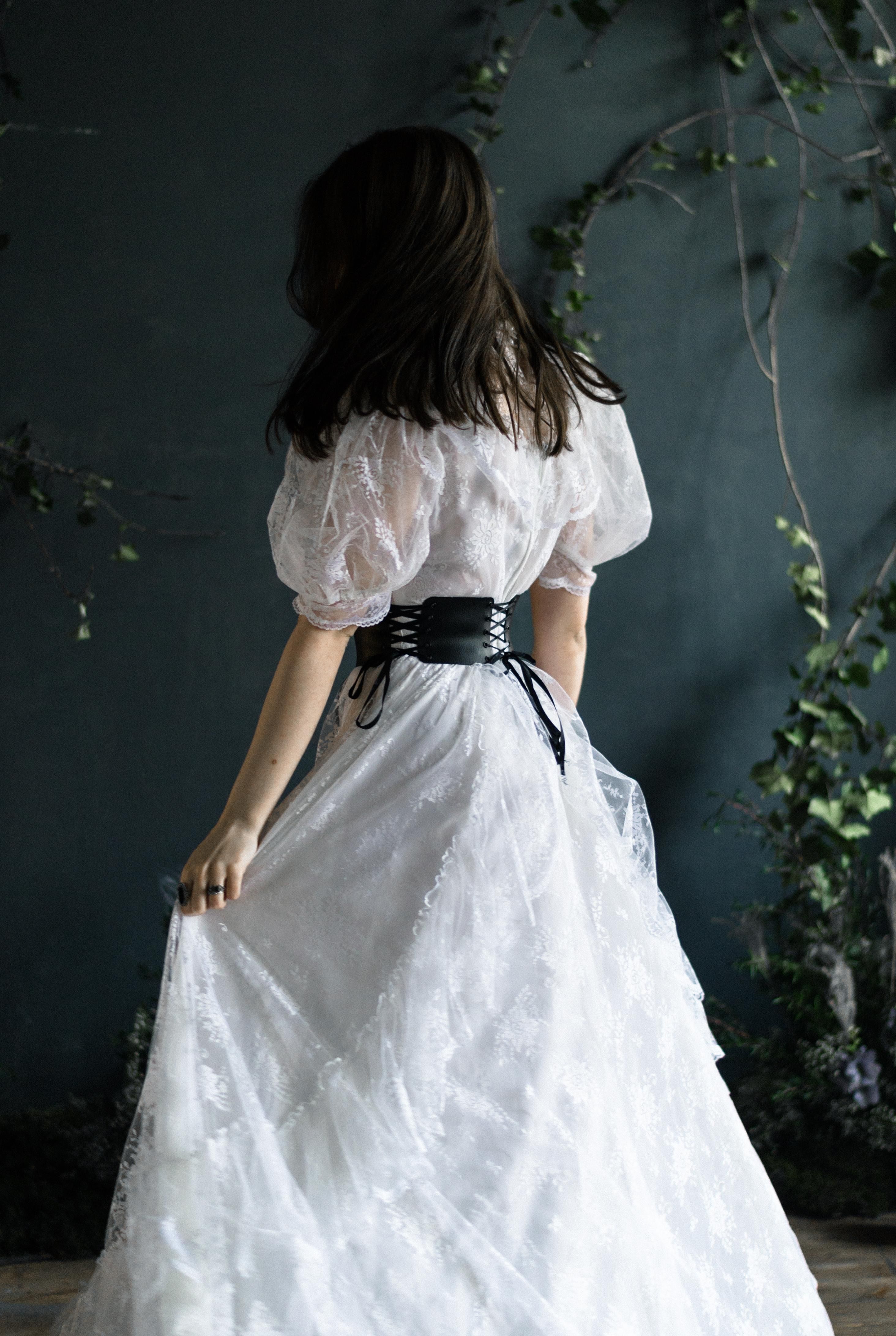 Brunette in Lace White Dress and Cinch Belt  Free Stock Photo