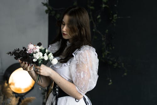 Bride Posing with Flowers