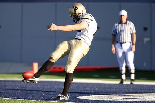 Football player kicking the ball
